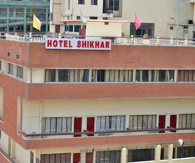 https://imgcld.yatra.com/ytimages/image/upload/t_hotel_yatra_city_desktop/v1433155396/Domestic Hotels/Hotels_Almora/Hotel Shikhar/OVERVIEW.jpg